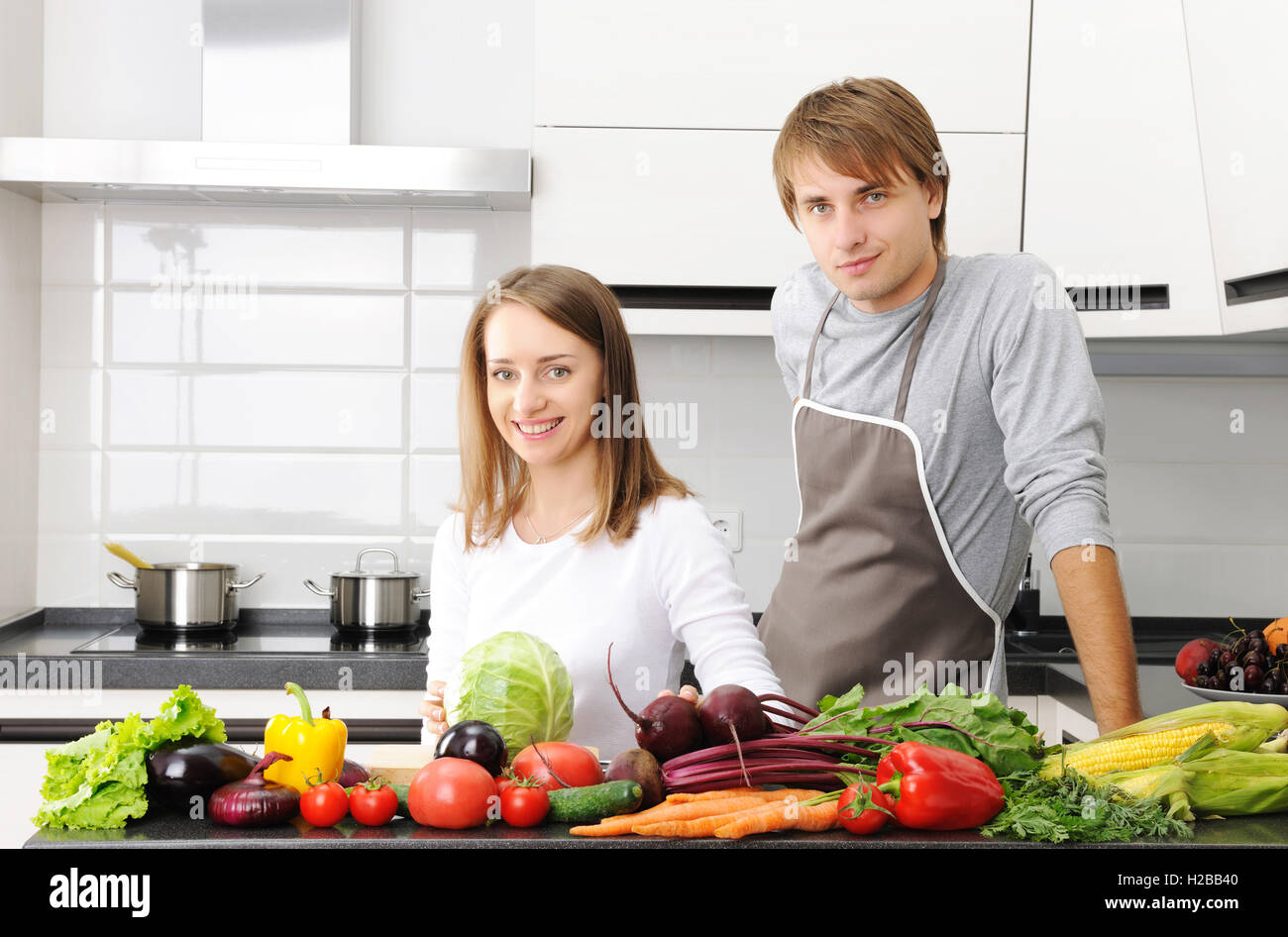 Woman cooking at kitchen table hi-res stock photography and images - Alamy