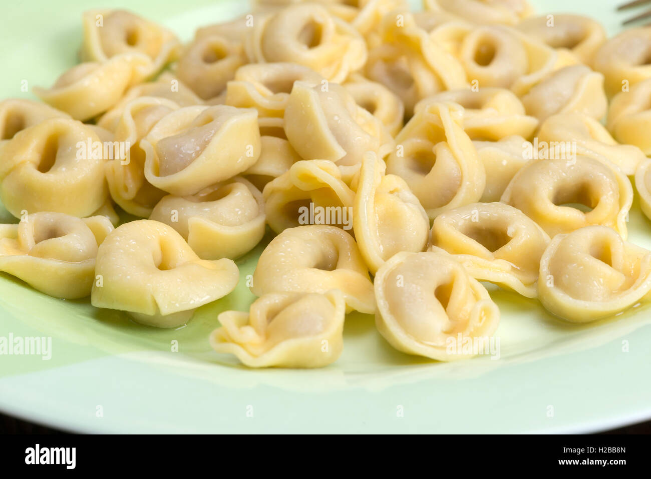 Tortellini - Italian ring-shaped pasta stuffed with a meat or cheese ...