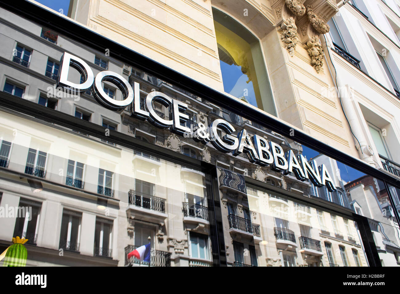 Signage of a famous luxury fashion brand on Rue Saint Honore in Paris