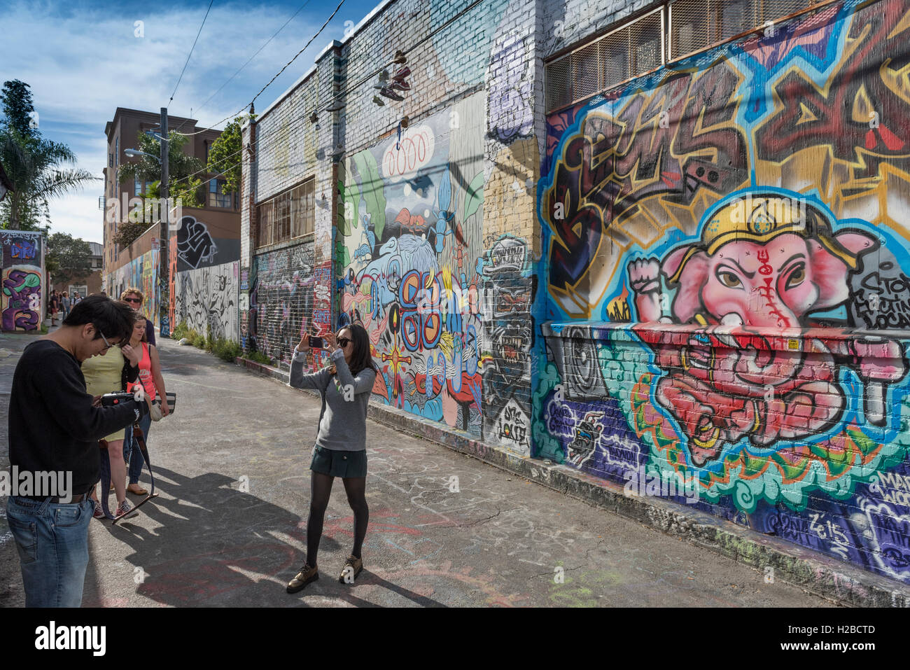 Murals And Graffiti Art On Walls In Clarion Alley In The Mission Stock Photo Alamy