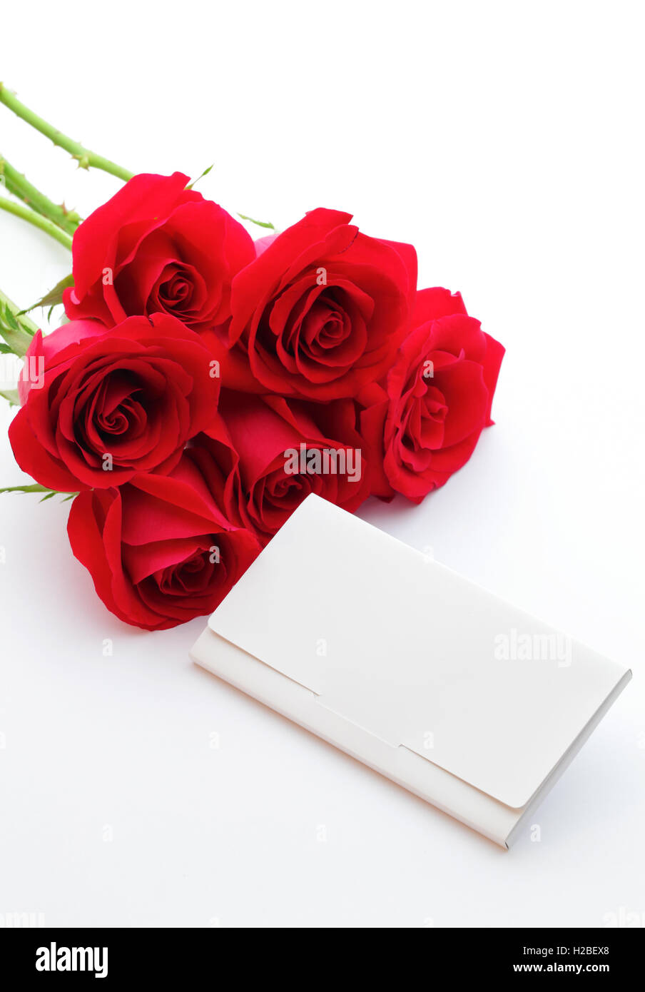Red rose and gift card Stock Photo - Alamy