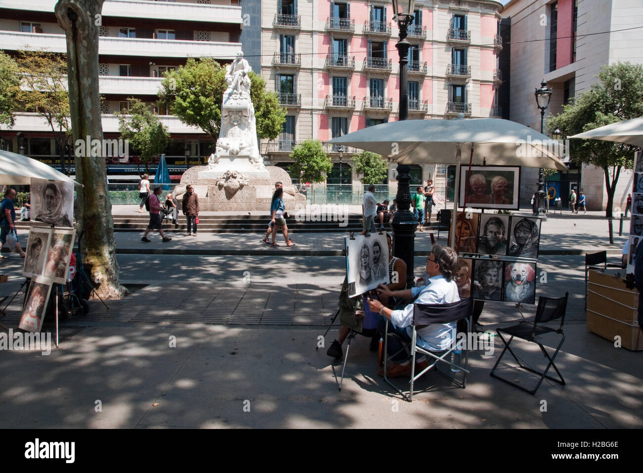 Pavement artists at work in La Rambla, Barcelona, Spain Stock Photo