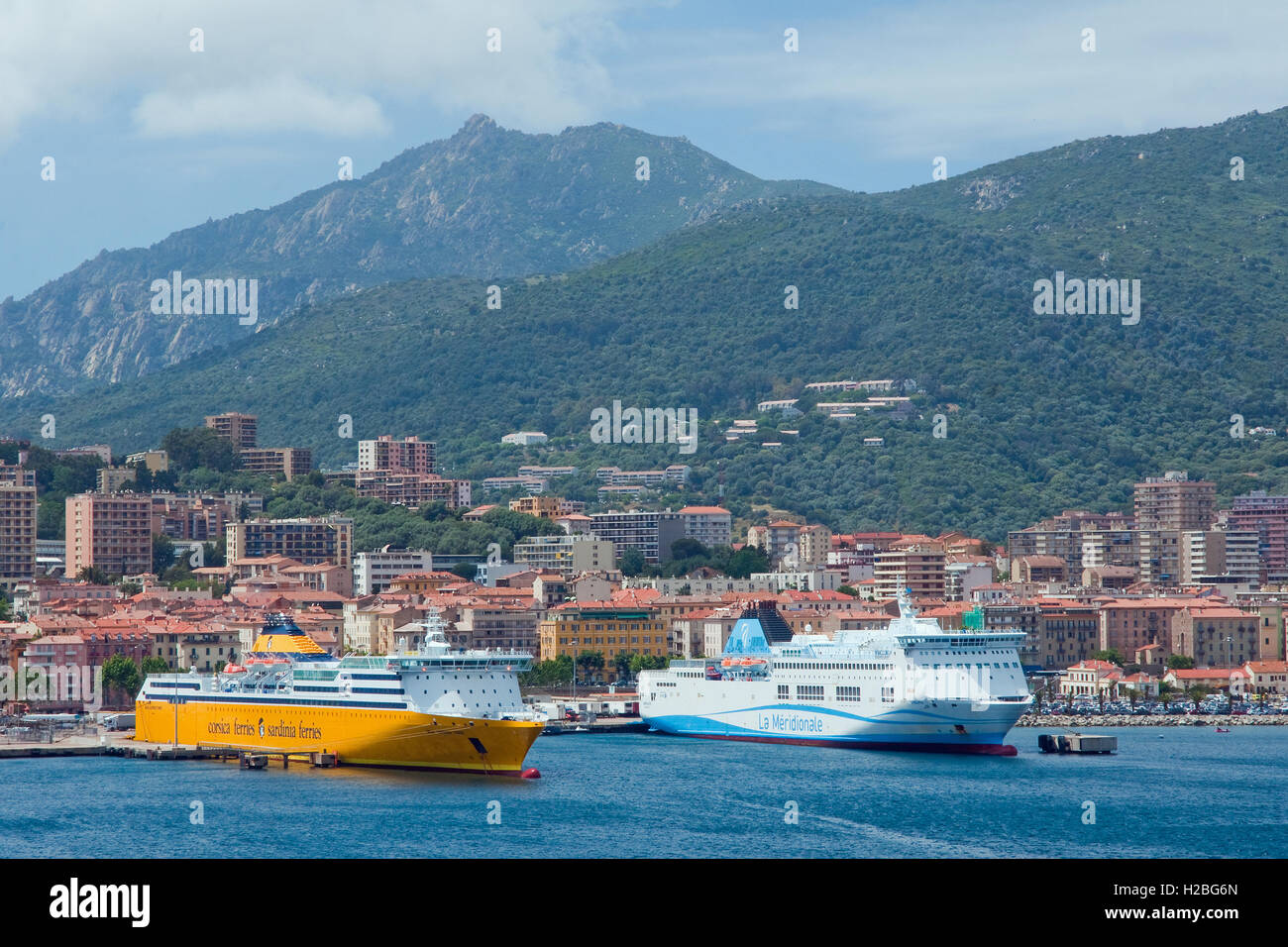 Ajaccio, Corsica, with ferries to the French and Italian mainlands moored at the Ferry Terminal Stock Photo