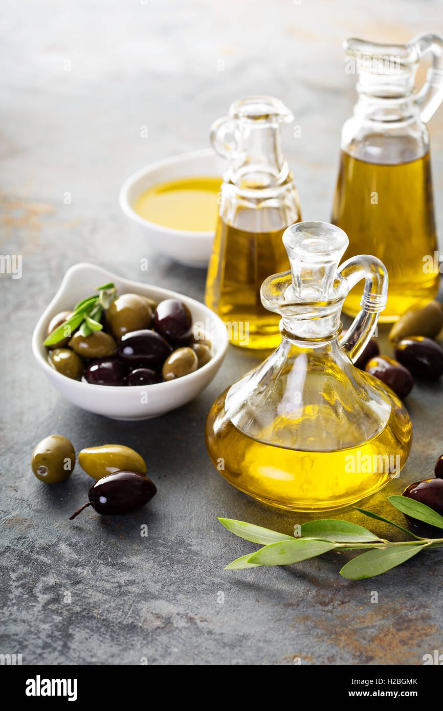 Olive oil in vintage bottles Stock Photo - Alamy