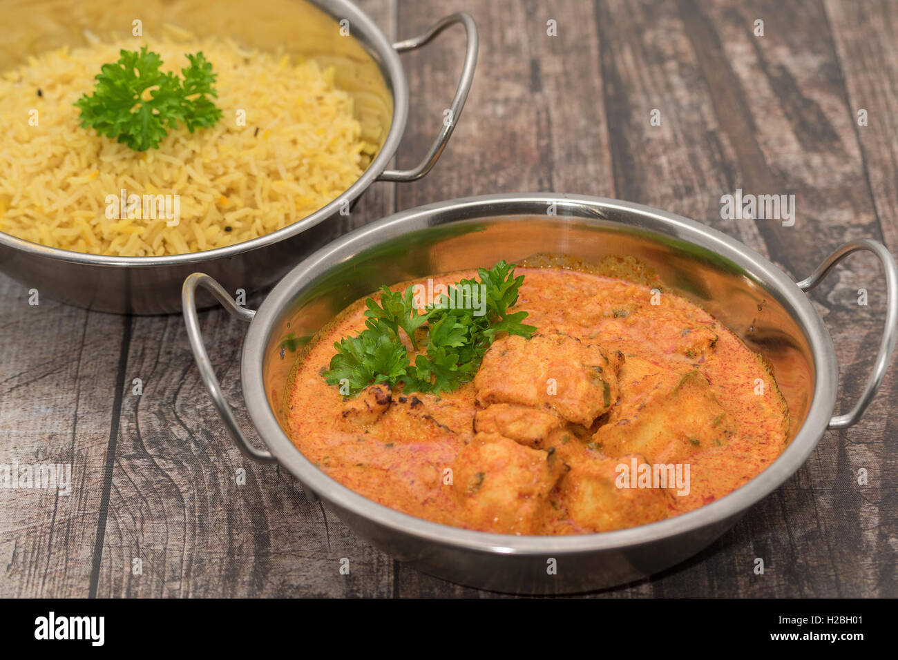 Chicken Tikka Masala - a classic medium spiced Indian curry with pieces of chargrilled chicken in a rich creamy masala sauce Stock Photo