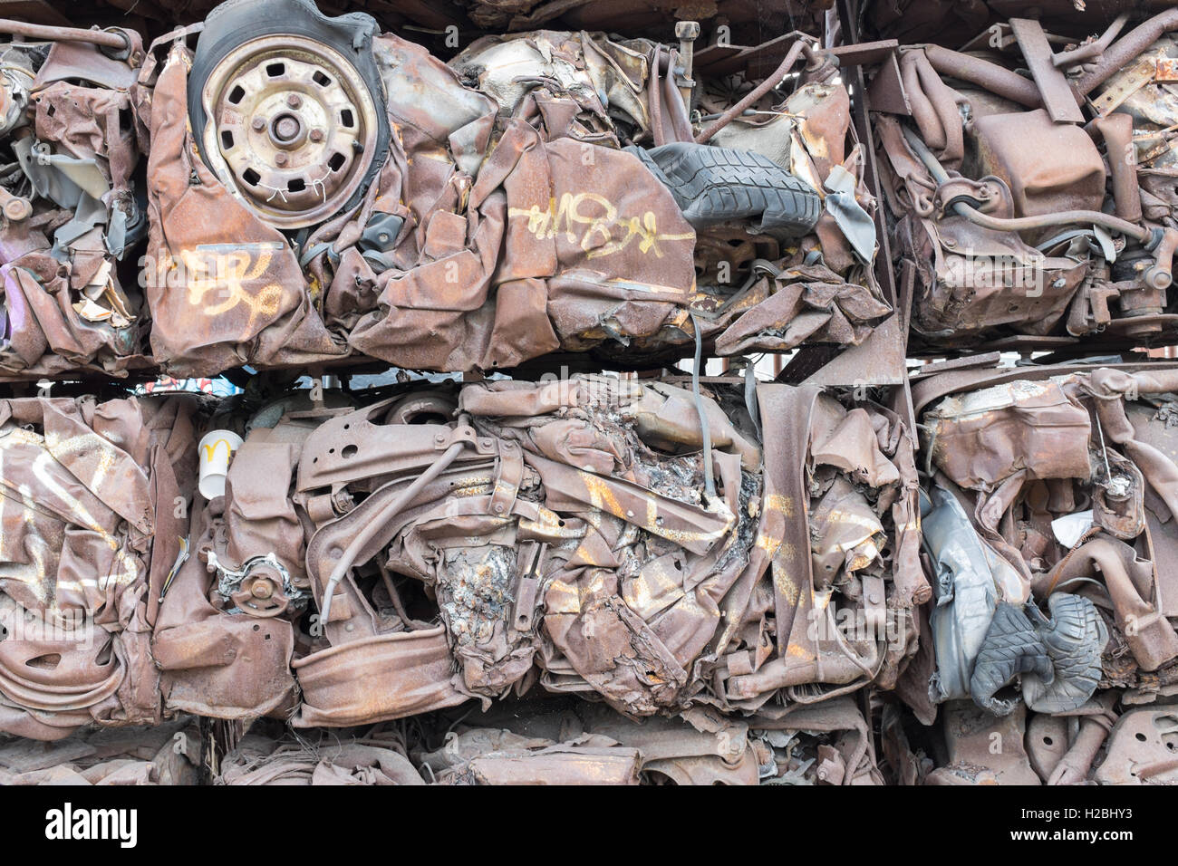 Crushed cars forming a wall in Digbeth, Birmingham Stock Photo Alamy