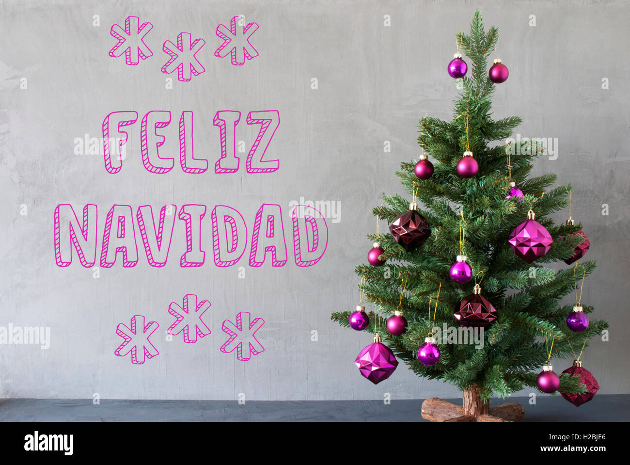 Tree, Cement Wall, Text Feliz Navidad Means Merry Christmas Stock Photo