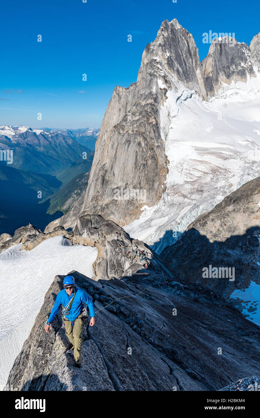 Chris Manning  on the West Ridge of Pigeon Spire in the Bugaboo Provincial Park Stock Photo