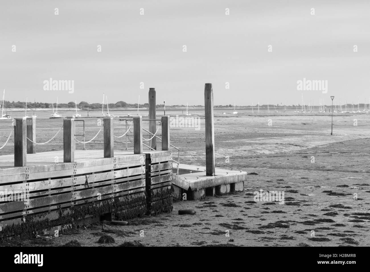 Black and white image of the jetty at Emsworth sailing Club Emsworth Hampshire England Stock Photo