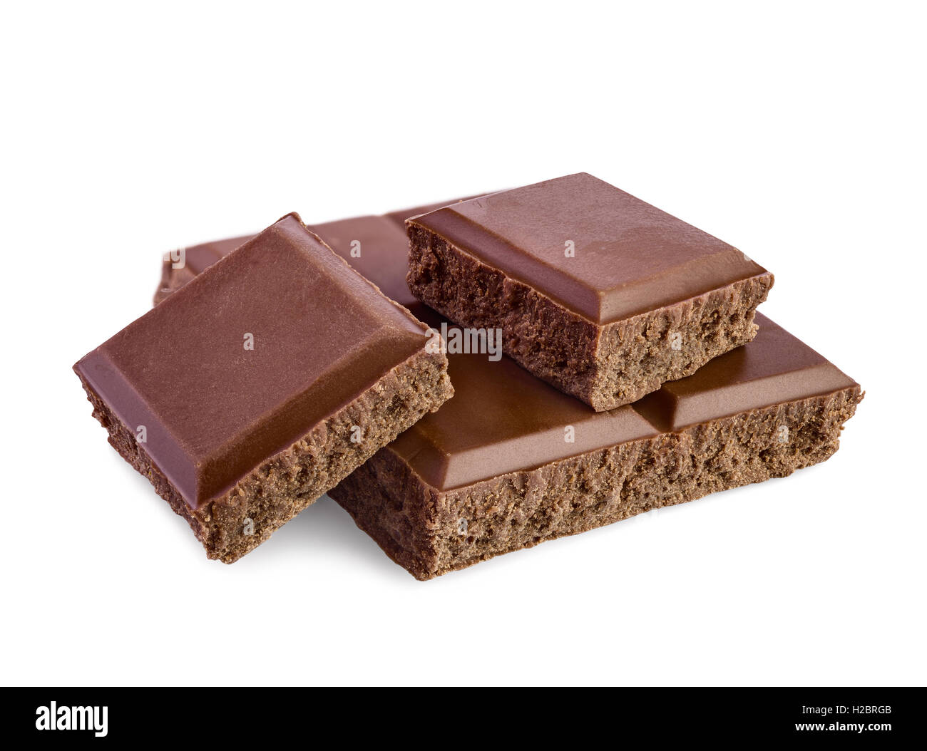 broken pieces of chocolate bar isolated on white Stock Photo