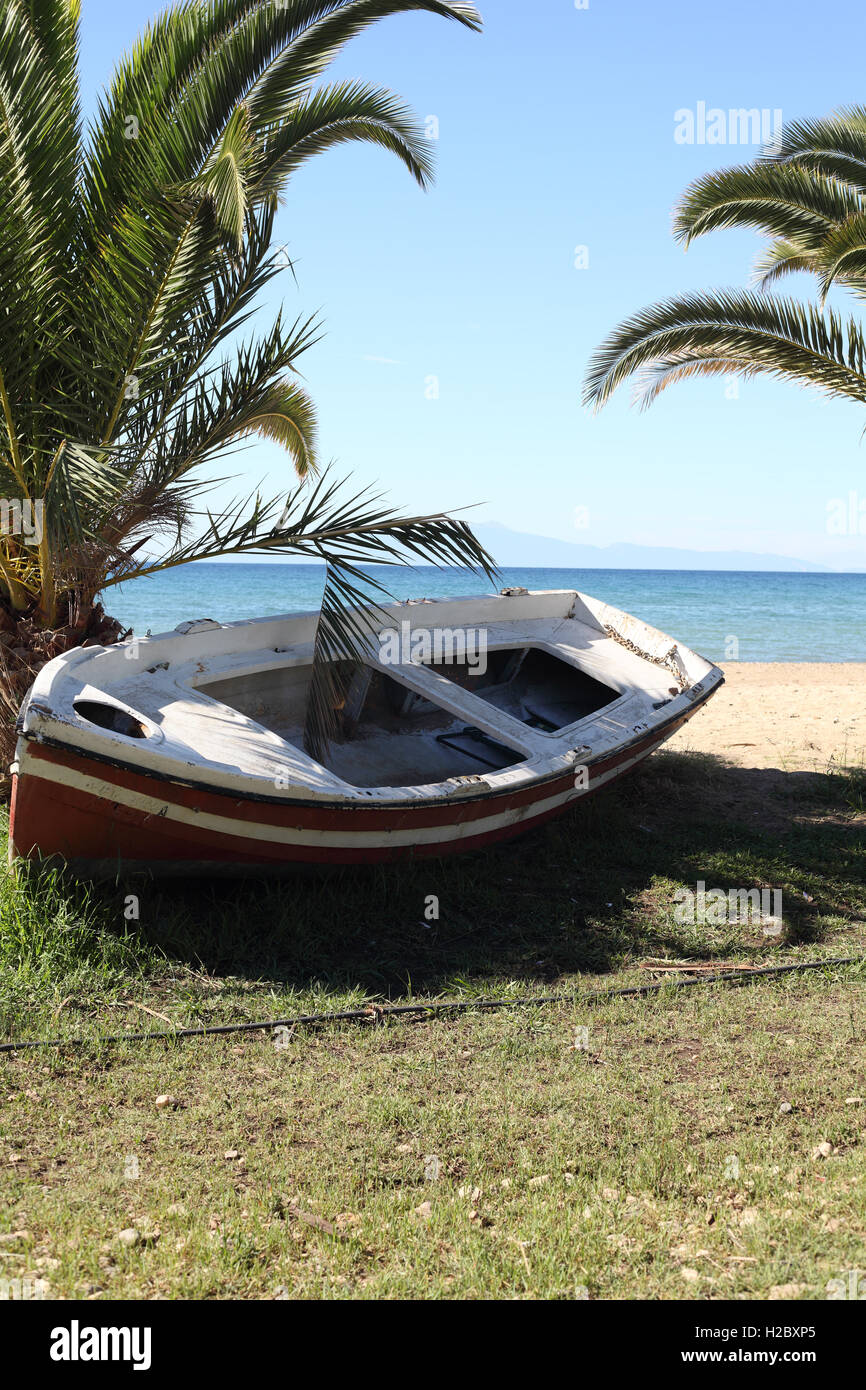 Old fishing boat on Dionisiou beach, Halkidiki, Greece Stock Photo