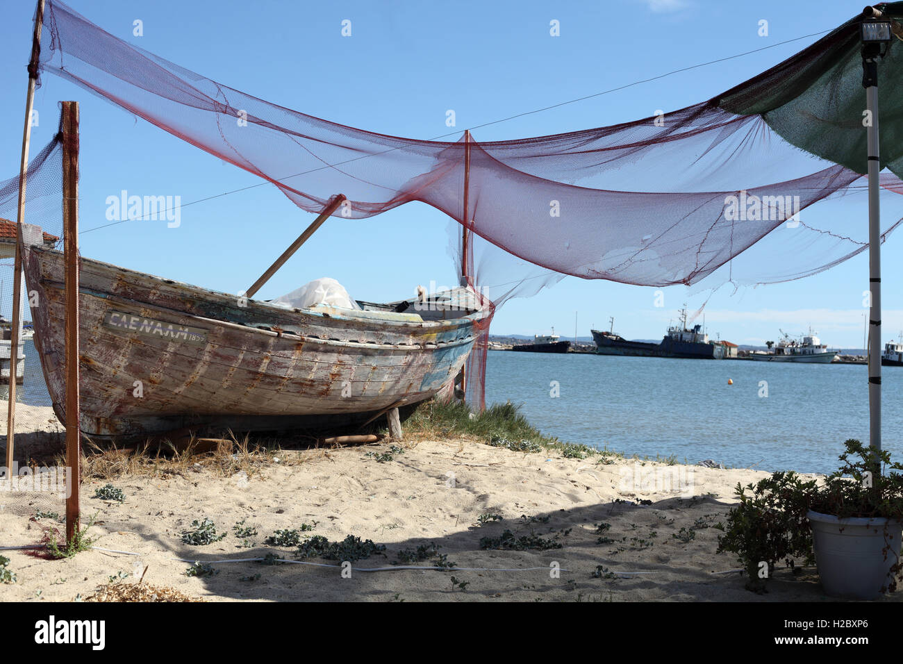 Old fishing boat and nets, Nea Moudania harbour, Macedonia, Greece Stock Photo