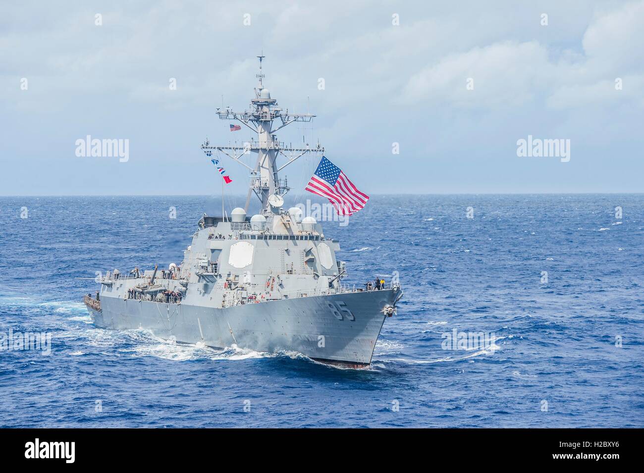 The USN Arleigh Burke-class guided-missile destroyer USS McCampbell steams in formation to signify the completion of Valiant Shield exercises September 23, 2016 in the Philippine Sea. Stock Photo