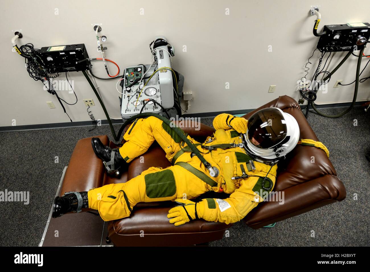 A U.S. Air Force U-2 pilot checks his high-altitude full pressure suit before a flight at the Beale Air Force Base January 8, 2013 in Maryville, California. Stock Photo