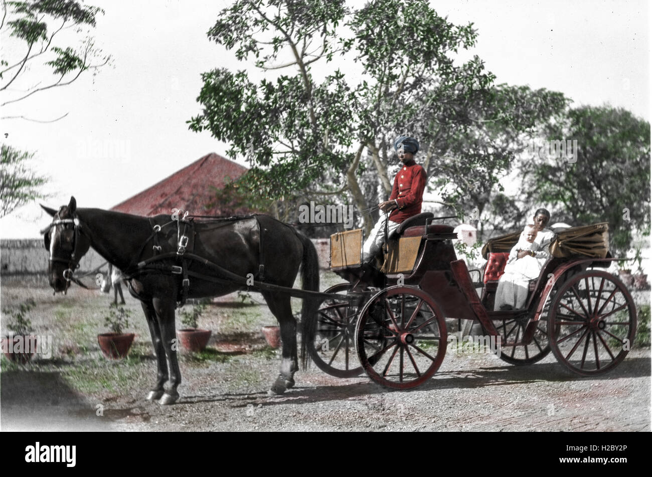 Horse and carriage outside Lt.Col Austin Frost's home in Poona. The baby (Tom Frost) is being held by his Ayah Stock Photo