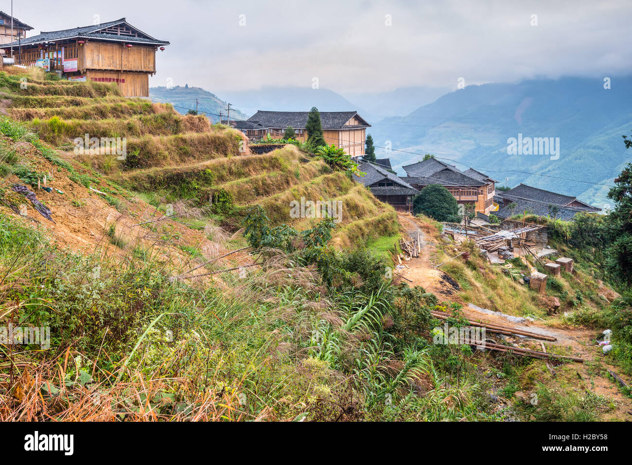 Traditional chinese Long Ji minority village wooden houses in cloudy weather Stock Photo