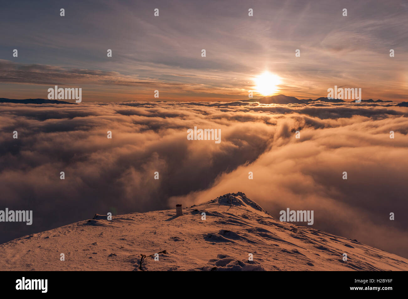 Sunset during inversion. Tatry Stock Photo - Alamy