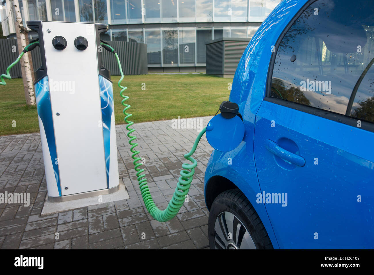 Modern electric car charging Stock Photo Alamy