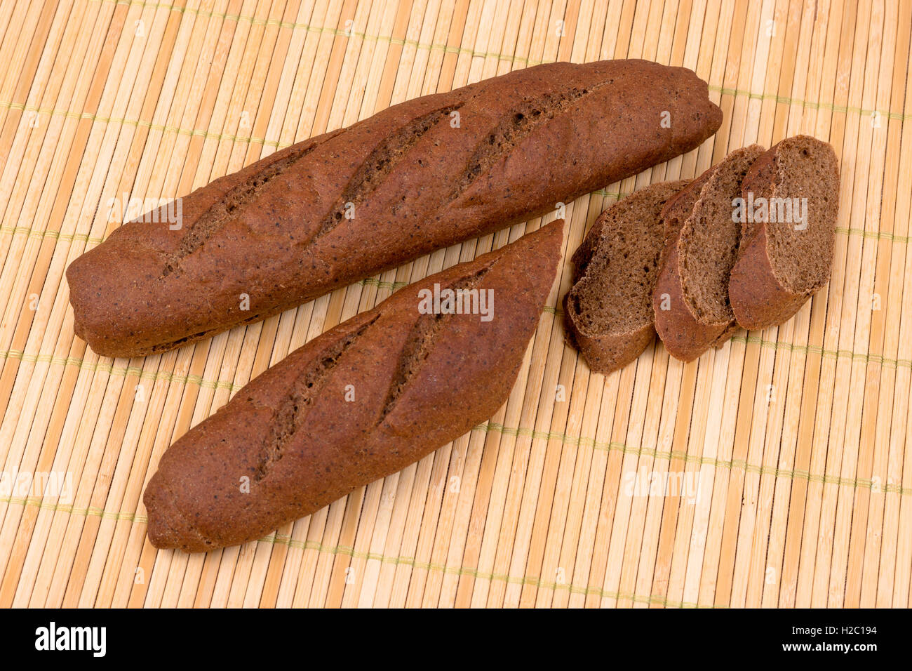bread from durum wheat on wicker mat of bamboo Stock Photo