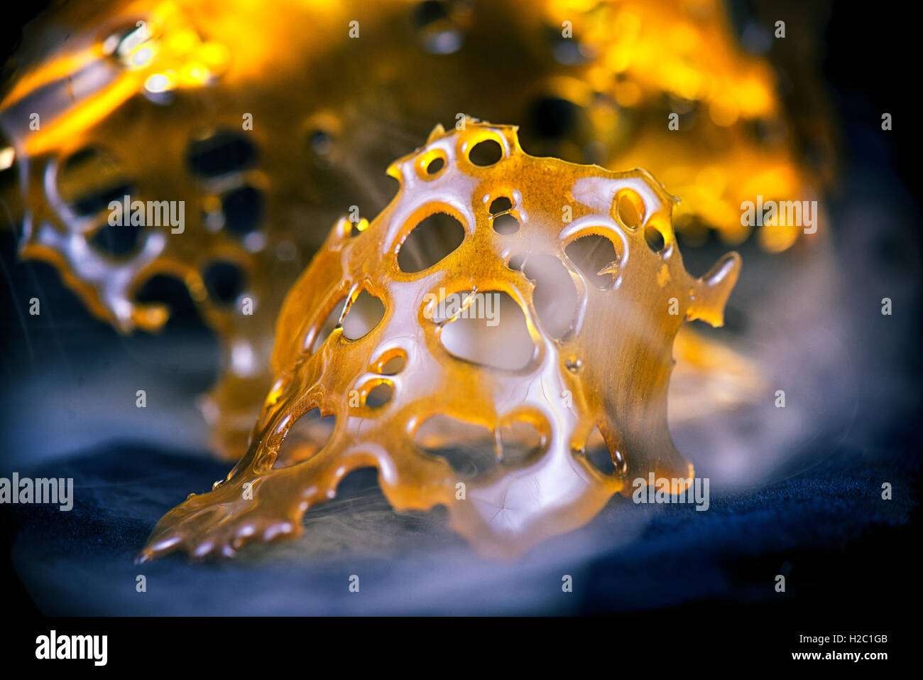 Close up detail of marijuana oil concentrate aka shatter Stock Photo