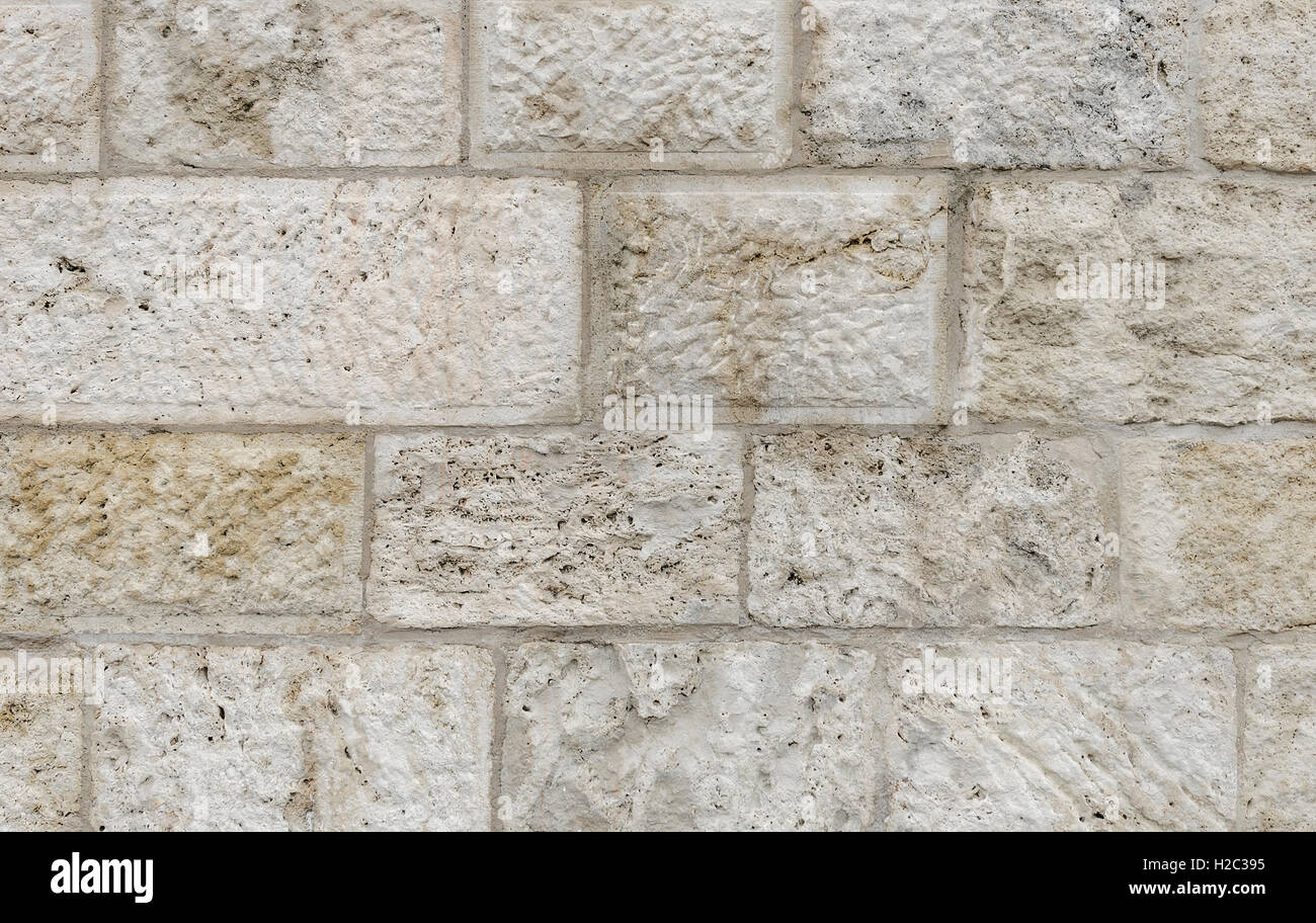 Wall made of stone blocks. Background for your text placement. Stock Photo