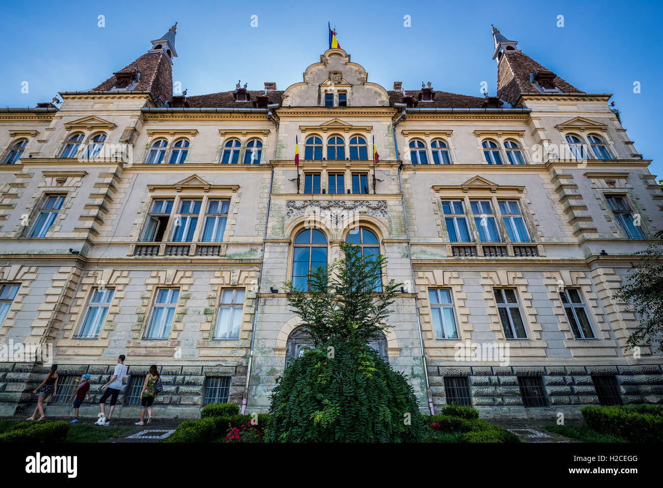 Building of City Hall from 19th century in Historic Centre of Sighisoara city, Transylvania region in Romania Stock Photo