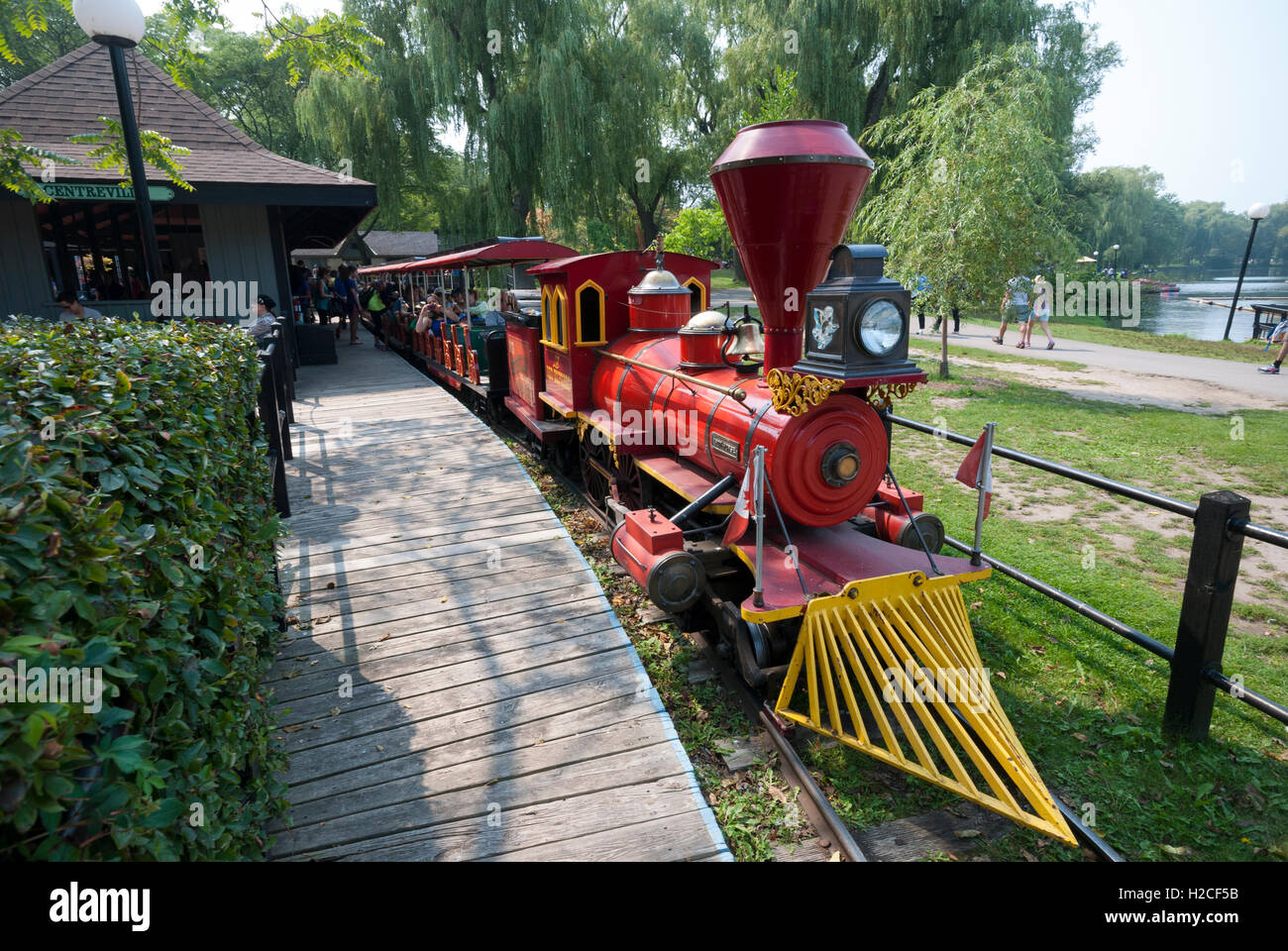 The well-known Centreville miniature train ride at Centreville amusement park on the Toronto Island park. Toronto Ontario Canada Stock Photo