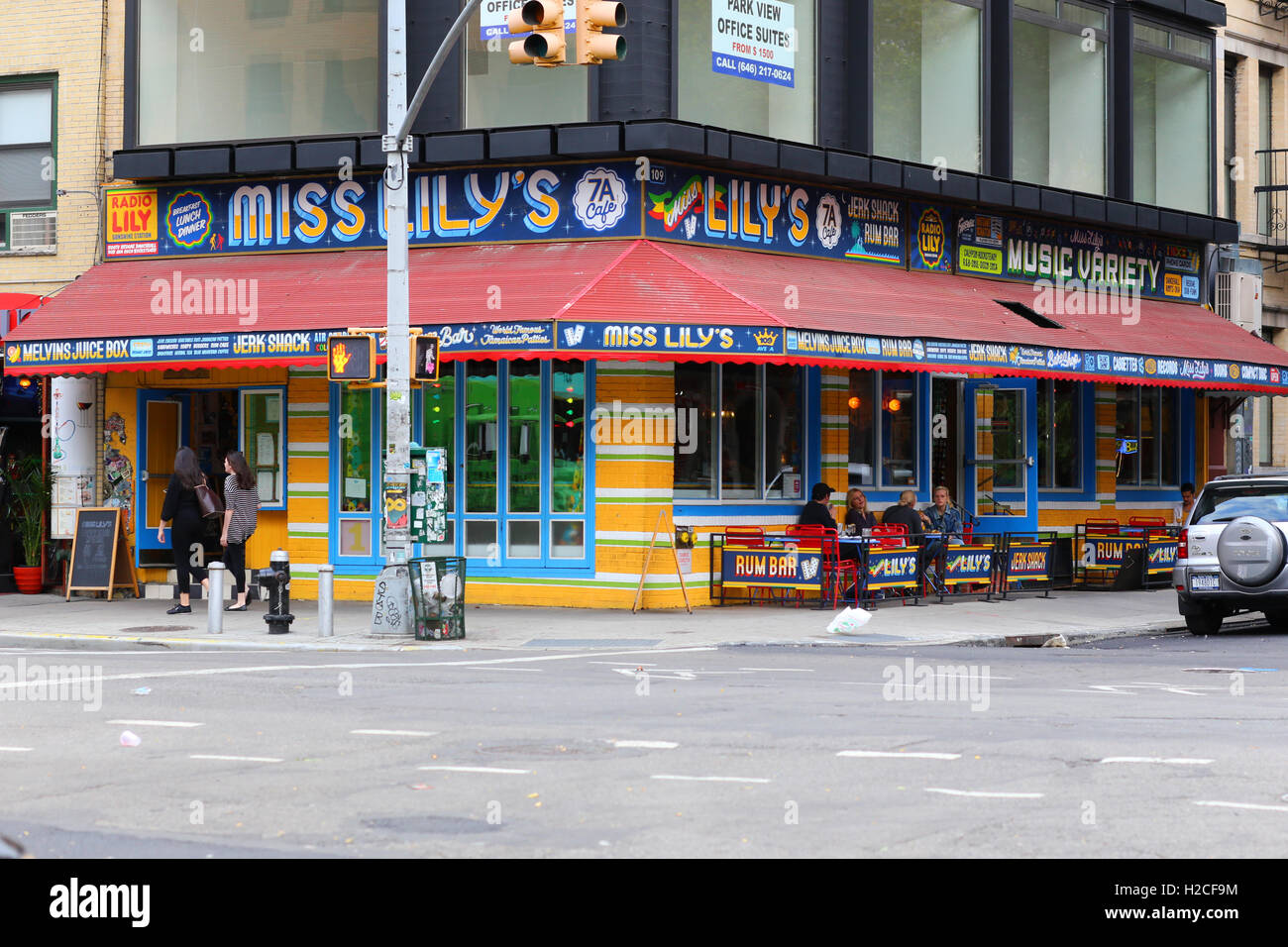 Miss Lily's 7A Cafe, 109 Avenue A, New York, NY. exterior storefront of a Jamaican restaurant in the East Village neighborhood of Manhattan. Stock Photo
