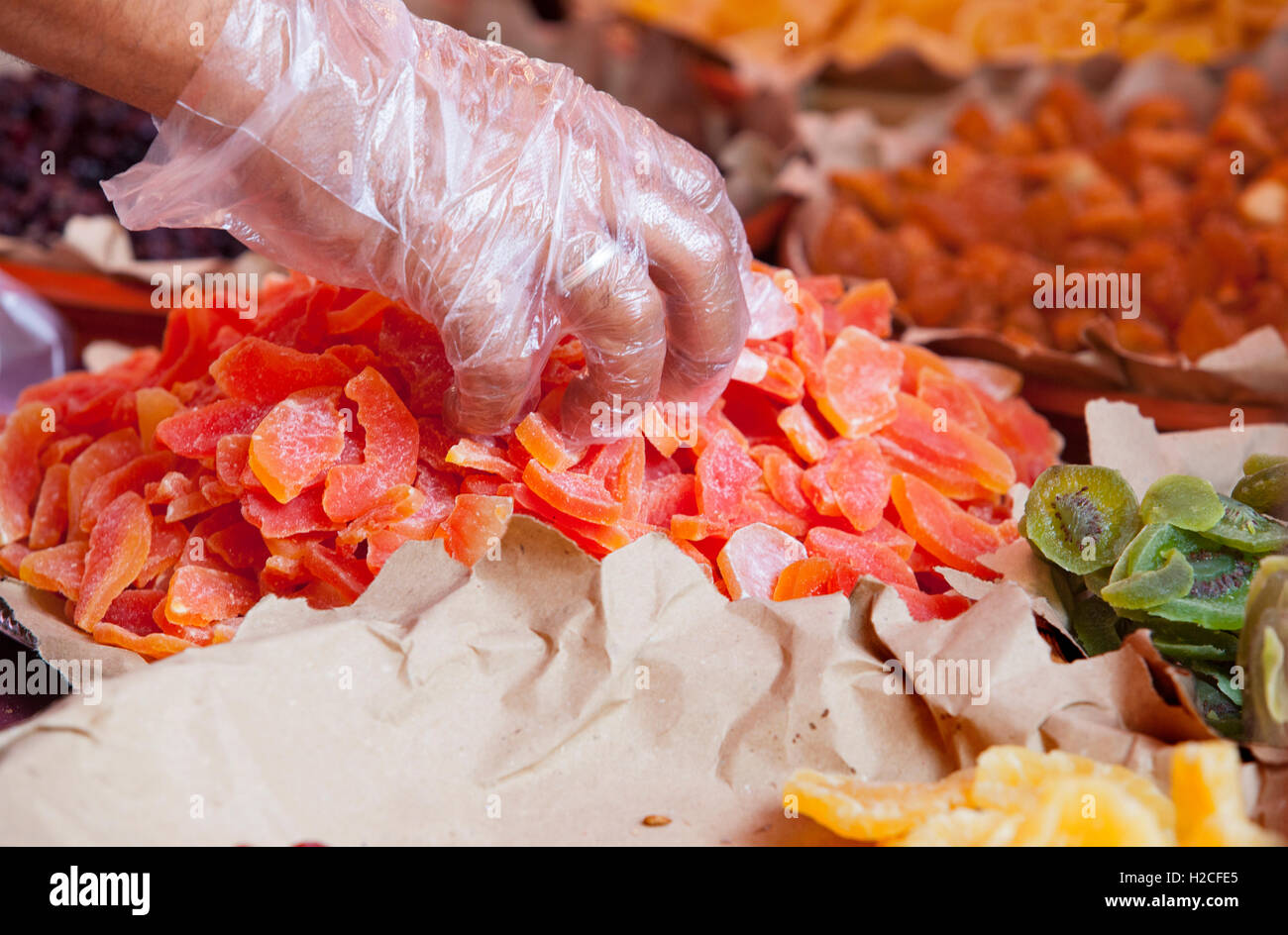 Colorful sweets, candied, dried fruit and jellies at street market stall Stock Photo