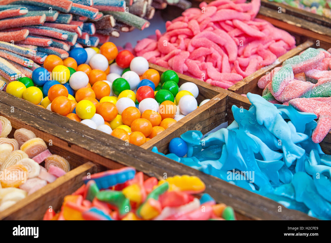Colorful sweets, candied and jellies at street market stall Stock Photo