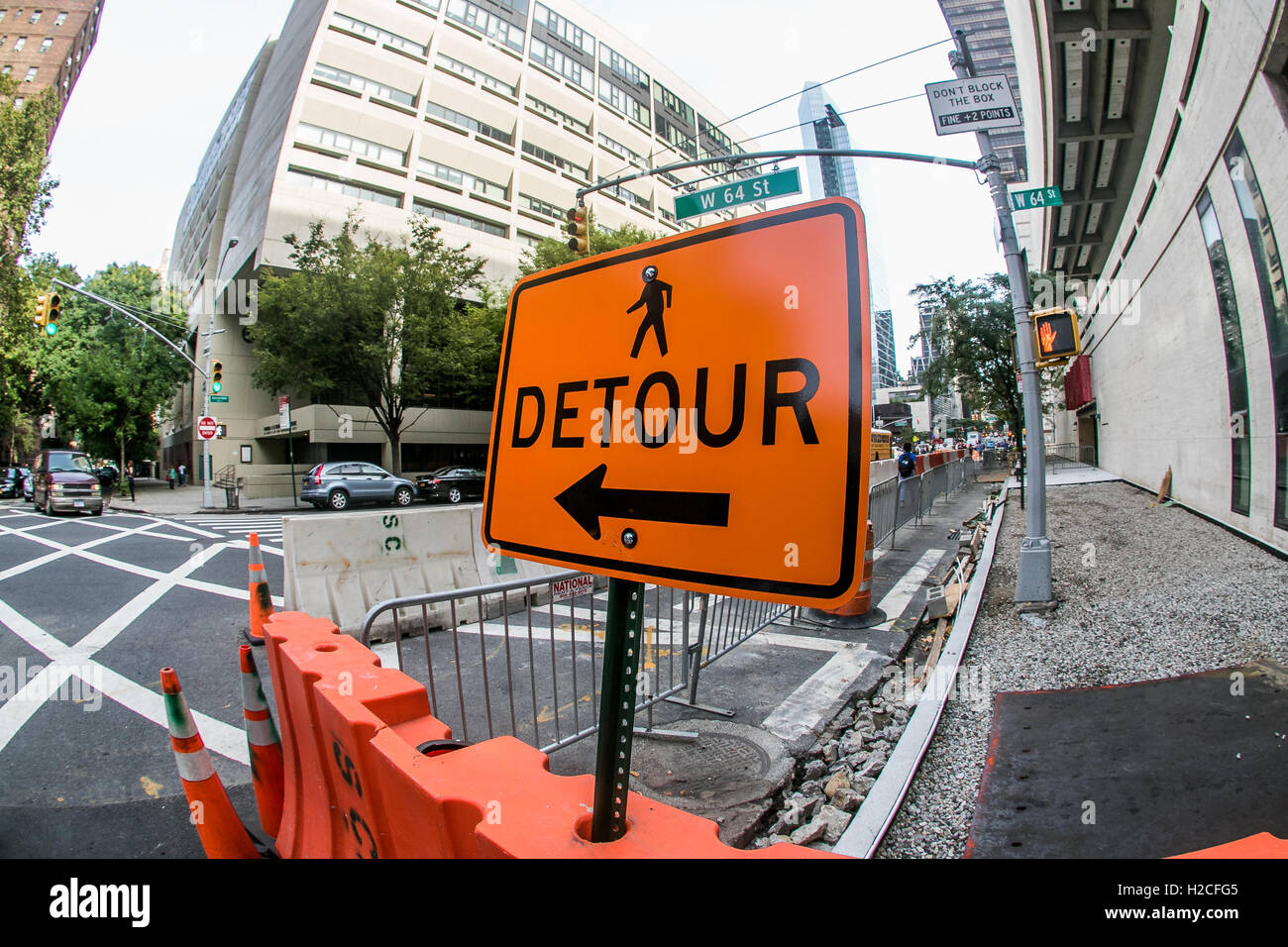 A Detour sign at a sidewalk construction site in Manhattan. Stock Photo