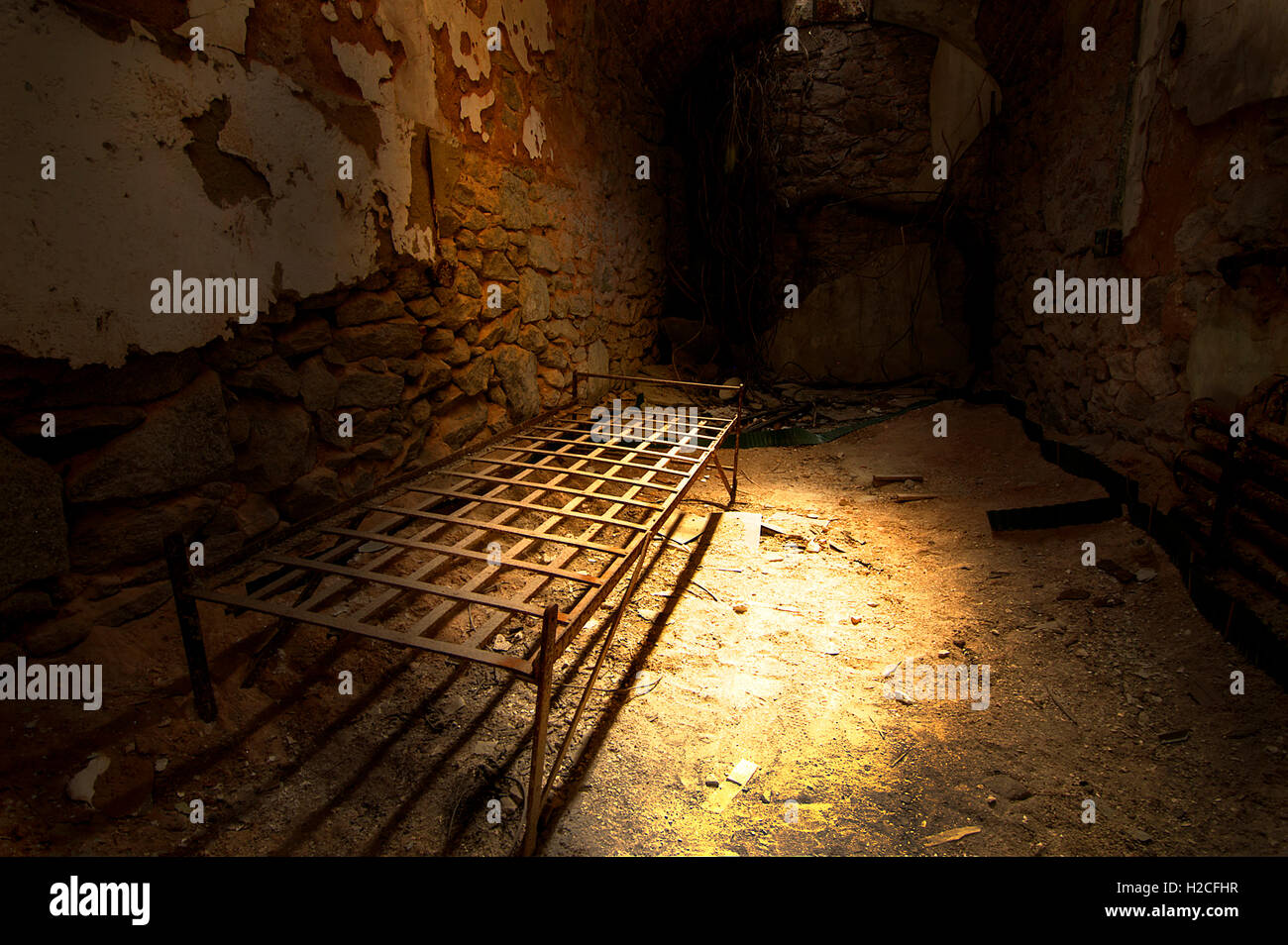 Abandoned prison cell inside Eastern State Penitentiary Stock Photo