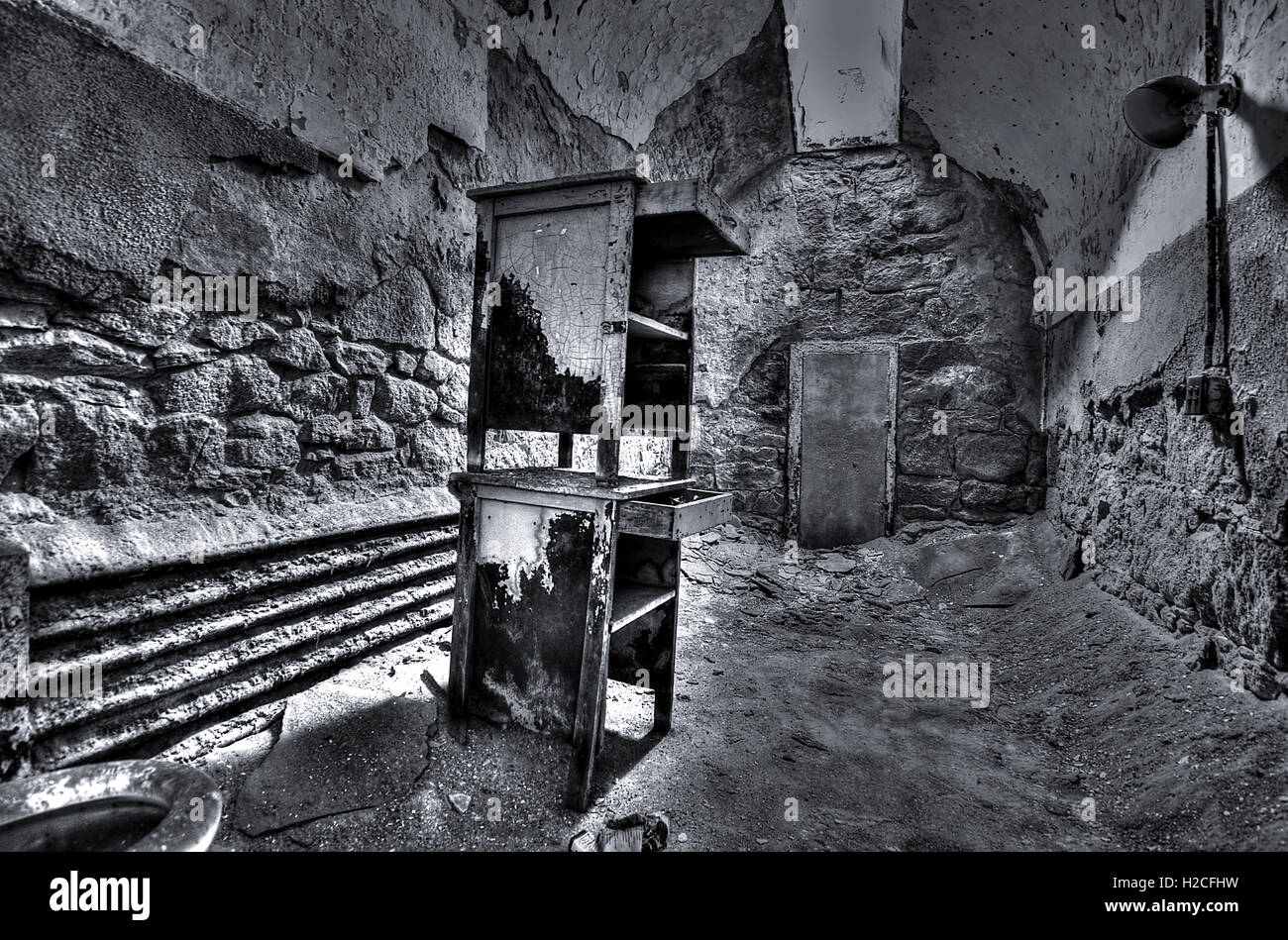 Abandoned prison cell inside Eastern State Penitentiary Stock Photo