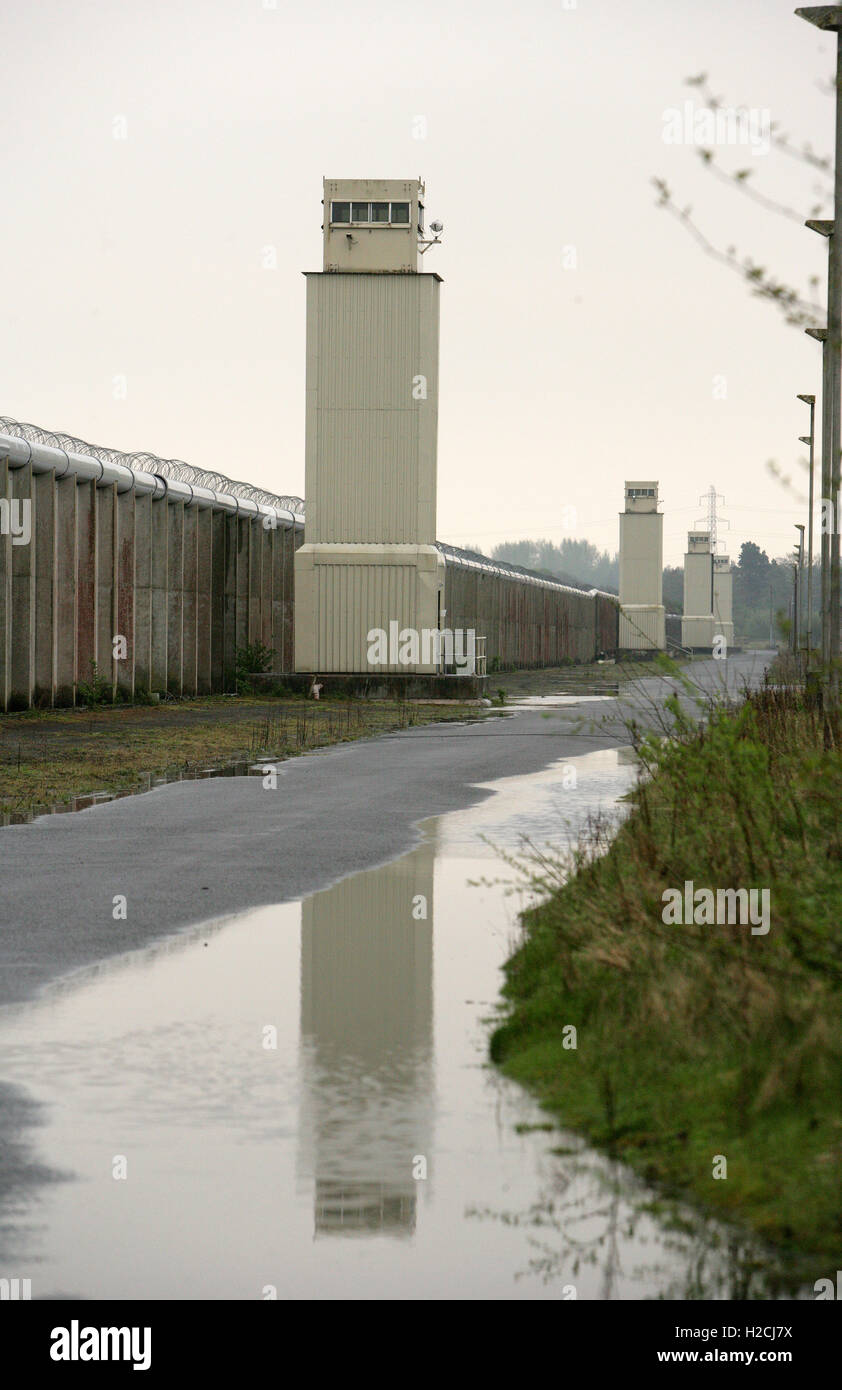 A watchtower and perimeter wall marks the boundary of the former Maze Prison, west of Belfast in Northern Ireland, U.K.  Prison, Stock Photo