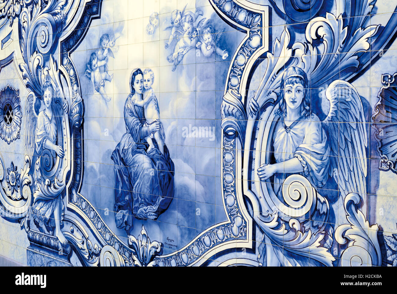 Portugal: Historic blue and white tiles with Mother Mary holding infant Jesus Stock Photo