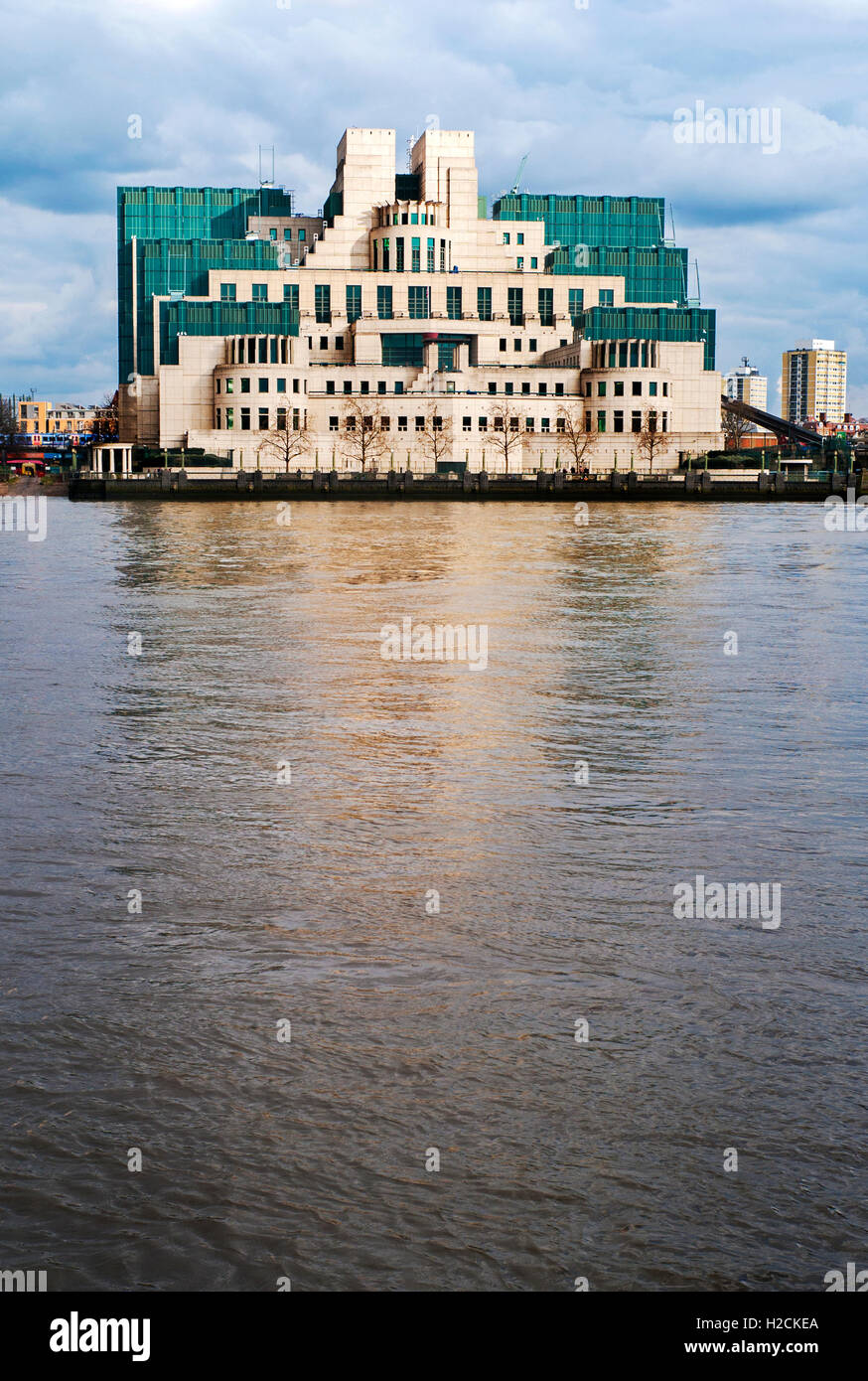 The SIS  MI6 MI5 building, reflection in river Thames London Stock Photo