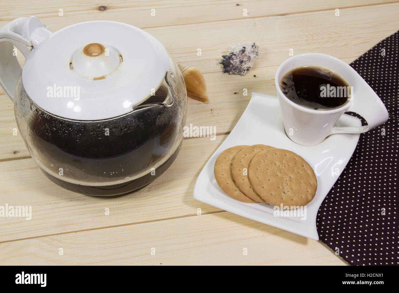 A cup of coffee with biscuit Stock Photo Alamy