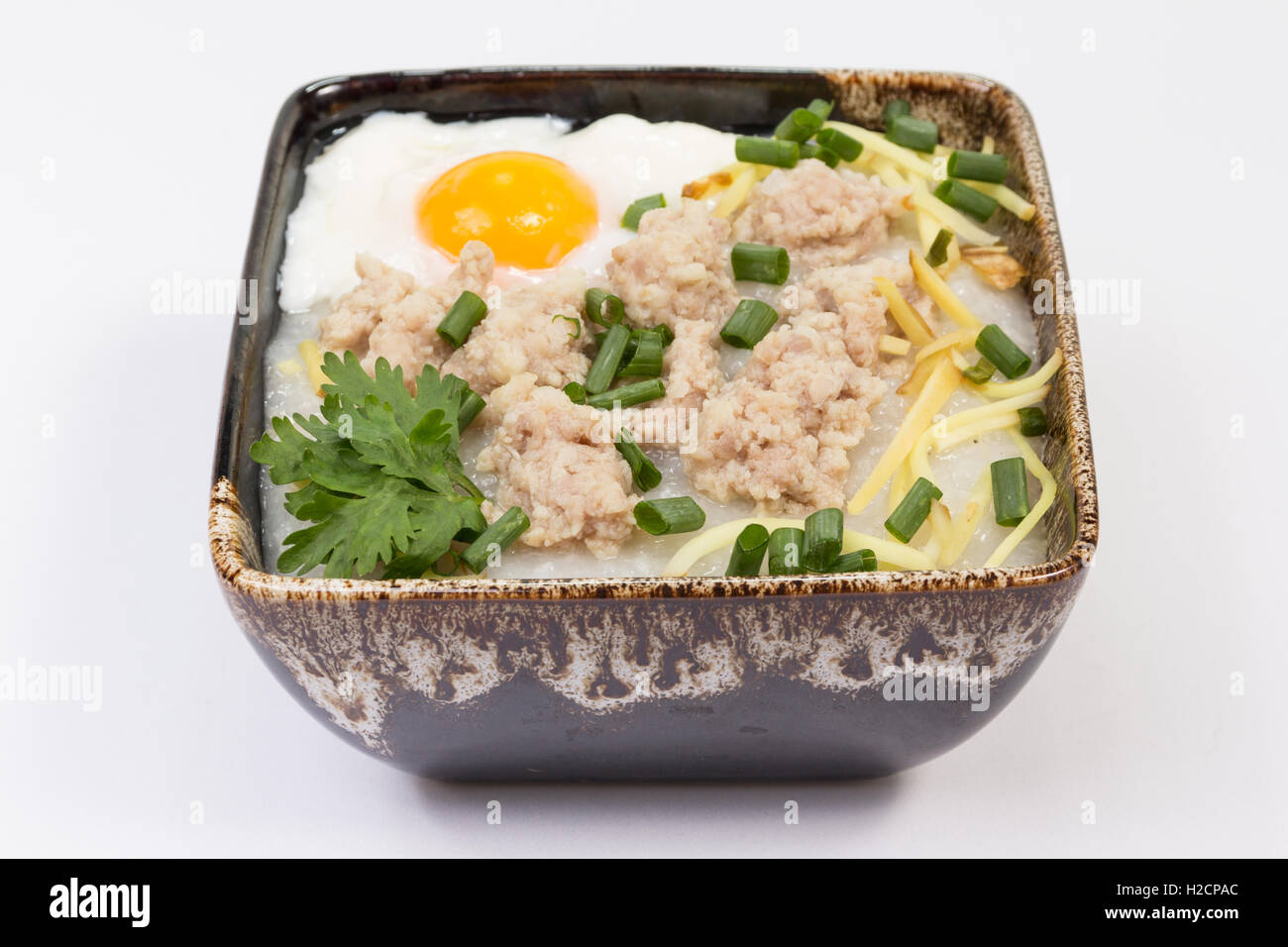 rice porridge with pork and soft boiled egg Stock Photo