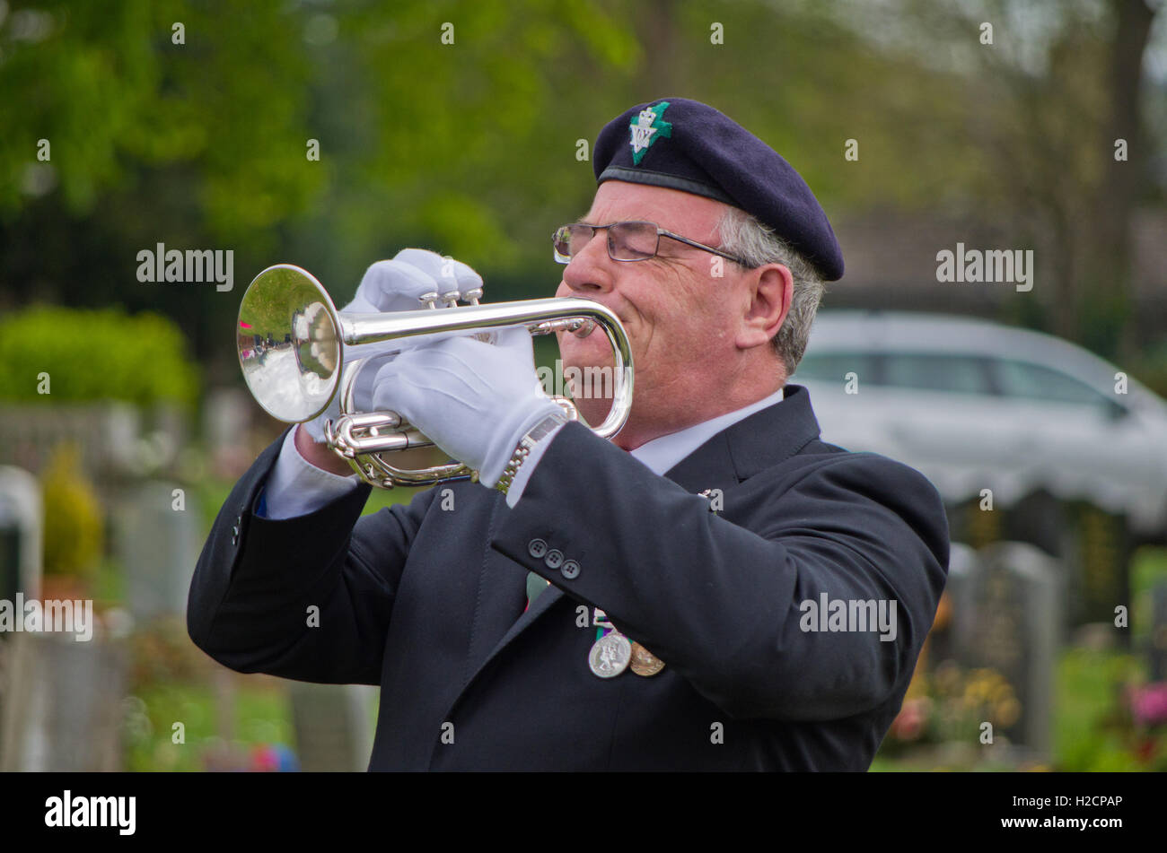 Bugler playing the Last Post at a ceremony to mark the centenary of