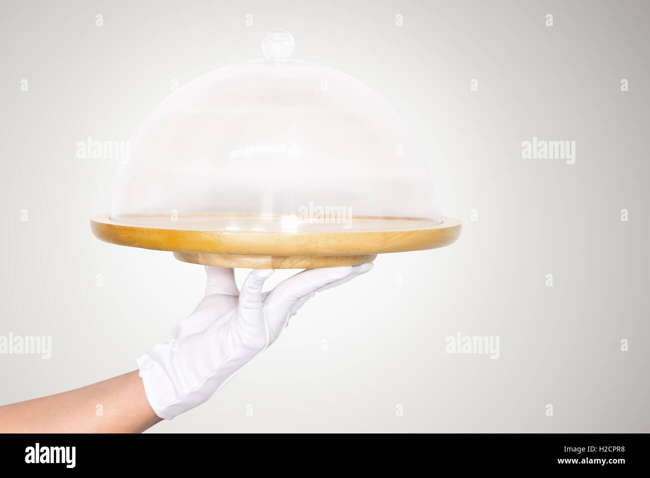 Hand holding empty wooden tray Stock Photo