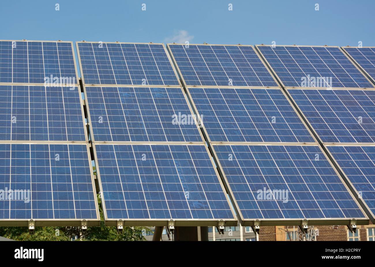 Ecological and renewable solar energy panels on the roof of a house ...