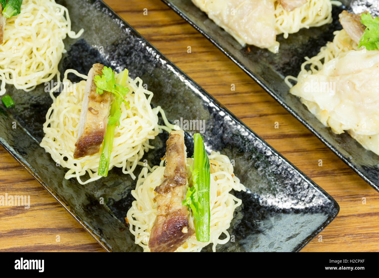 Noodle pork grill with dumpling Stock Photo