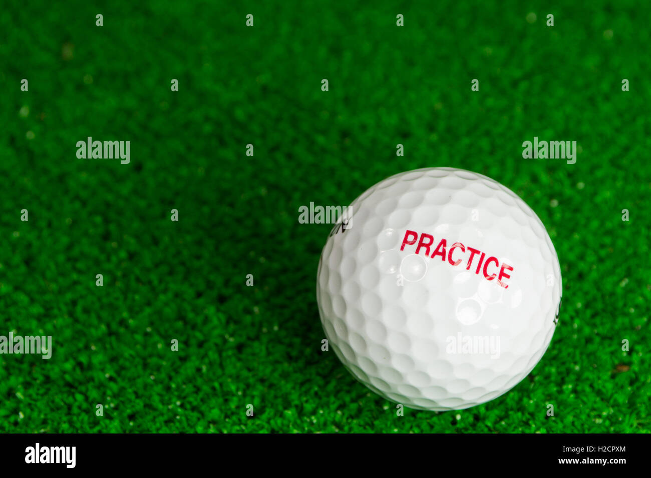 Golf ball on the green Stock Photo Alamy