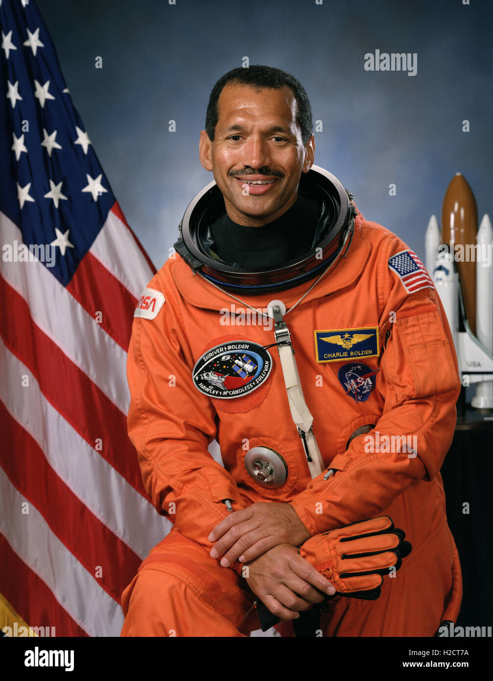Official portrait of NASA astronaut Charles Bolden Jr. wearing an orange launch and entry space suit October 17, 1991. Bolden is the current NASA administrator and was the first African-American to head the agency on a permanent basis. Stock Photo