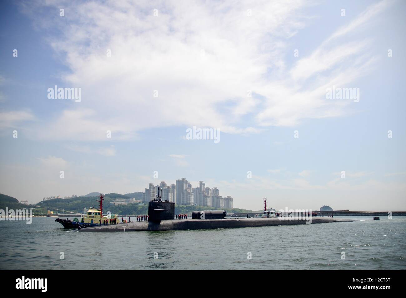 The USN Ohio-class nuclear-powered fleet ballistic guided-missile submarine USS Ohio arrives at the Republic of Korea Fleet Base for a regular port visit July 13, 2016 in Busan, Korea. Stock Photo