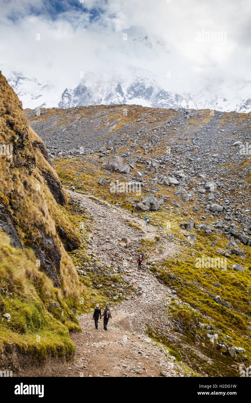 The Salkantay trek to Machu Picchu in Peru, looking towards Salkantay Mountain in the clouds, almost at Salkantay Pass Stock Photo