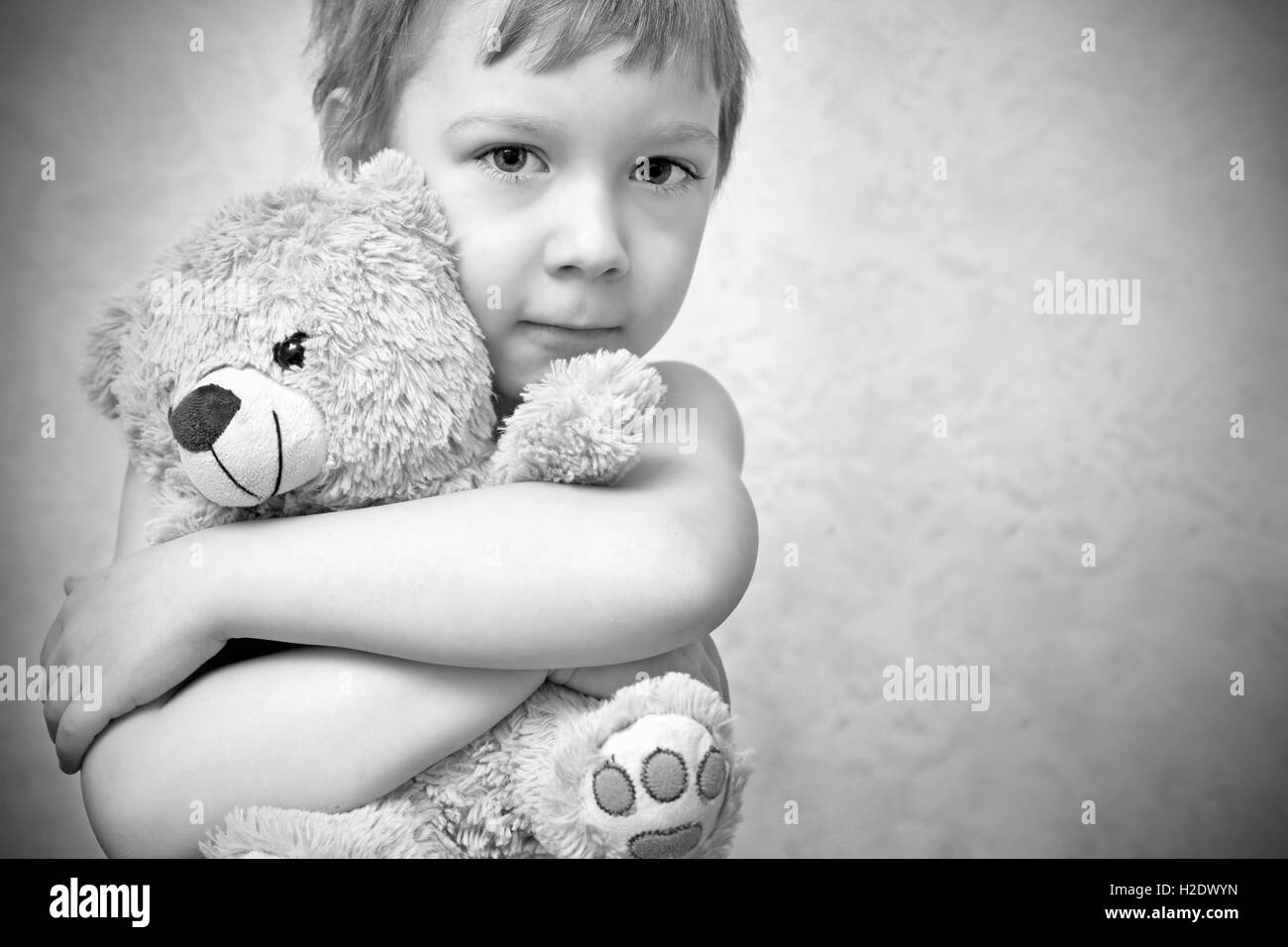 Young boy with teddy bear, portrait Stock Photo - Alamy