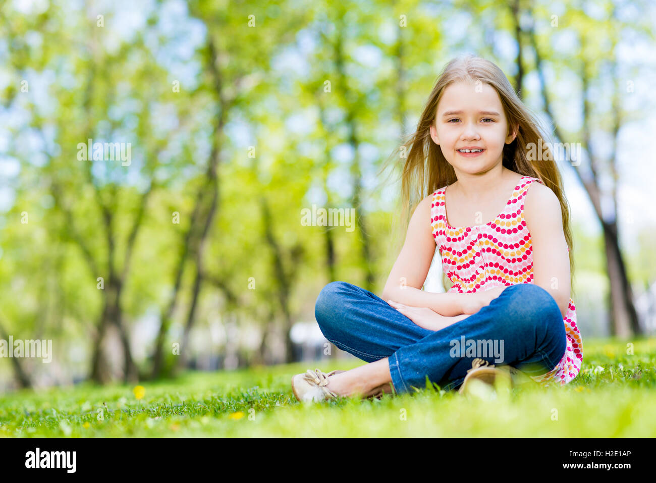 portrait of a girl in a park Stock Photo - Alamy