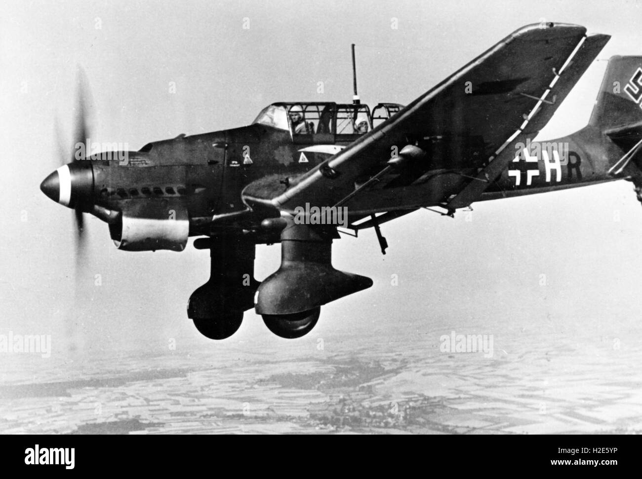 The Nazi propaganda image depicts a dive bomber, type Junker Ju 87, of the German Wehrmacht after the return of an airstrike against Great Britain. The photo was published in August 1940.