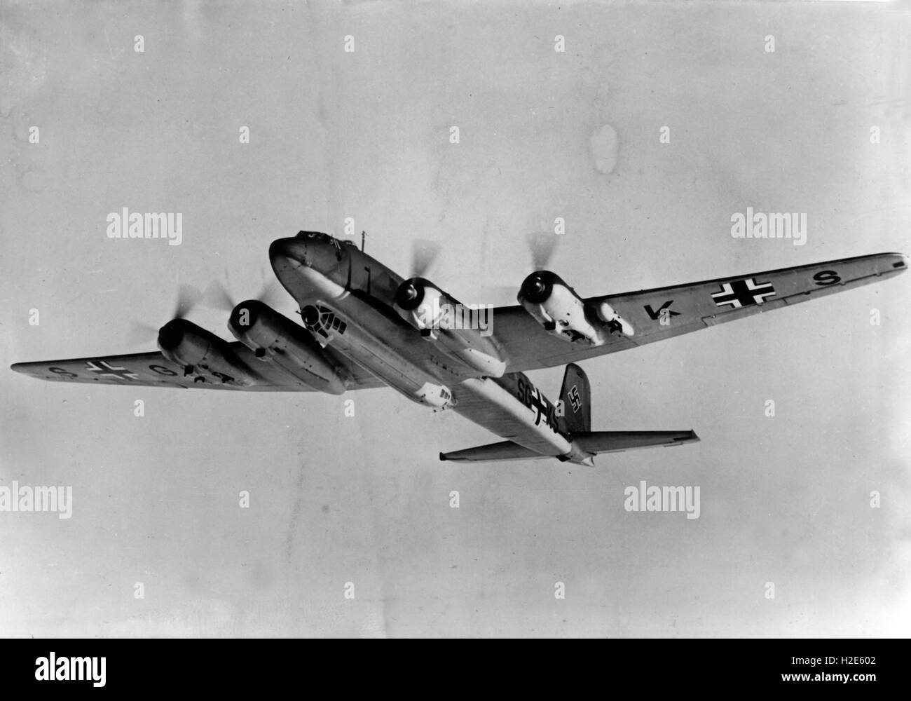 The Nazi propaganda image depicts a monoplane, type Focke-Wulf Fw 200 Condor, also known as 'Kurier' of the German Wehrmacht. The four-engined long-range airliner of the German Airforce was the first heavier-than-air craft to fly longThe photo was published in January 1941. Fotoarchiv für Zeitgeschichte - NO WIRE SERVICE -  | usage worldwide Stock Photo